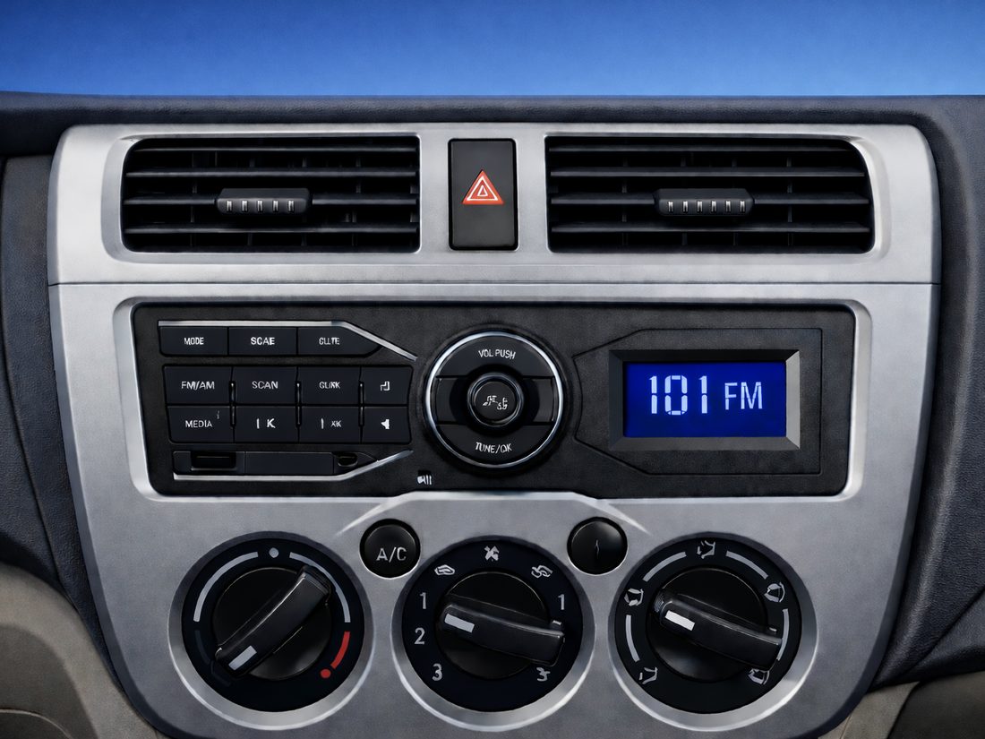 Console centrale du Startruck : autoradio FM et commandes de climatisation
